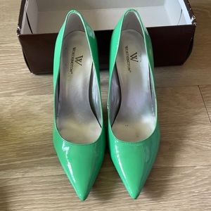 Pointed toe sea green heel.